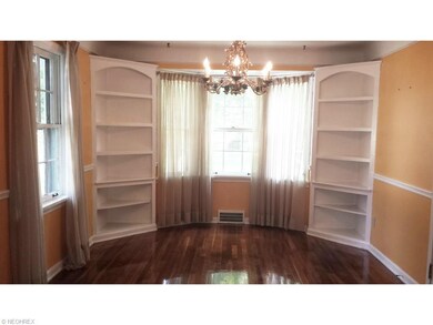 Formal Dining Room with Built-In Corner Cupboards 