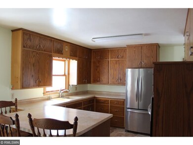 Eat in kitchen features disposal, flat top electri