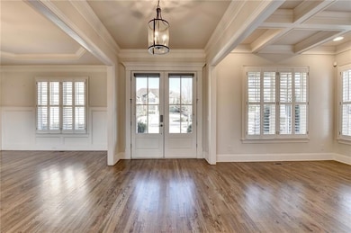 Entryway featuring ornamental molding, a wealth of