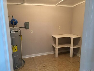 Big walk in laundry/ pantry with access to side of