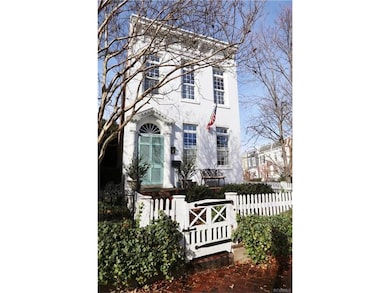 The detached house is located on the quiet side st