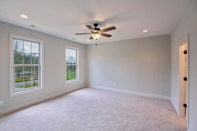 The Owners Suite includes 2 separate Master Closets with easy access to the laundry room.