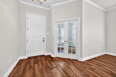 Foyer.  French doors lead to office.