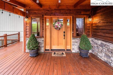 STUNNING stone/cedar entry!  WELCOME HOME!