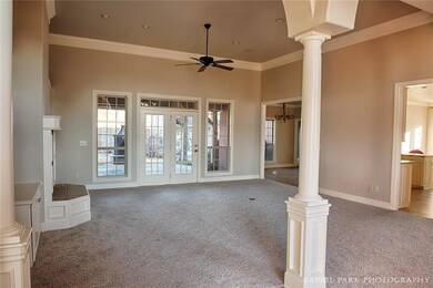 View from the entry.  Double French doors enter on