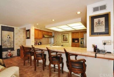 Kitchen features a full eat in bar