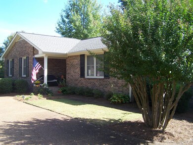 ANOTHER VIEW OF THE FRONT! THIS VIEW SHOWS THE COVERED PORCH!