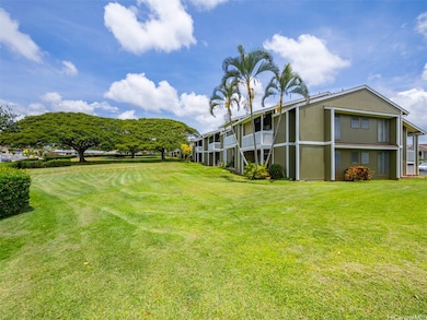 Back patio leads out to spacious greenery and park