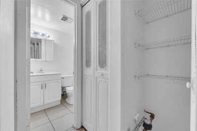 Half bathroom off of the dining room in  main livi