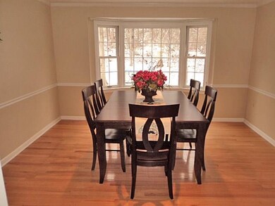 Dining with crown moldings, chair rail, recessed l