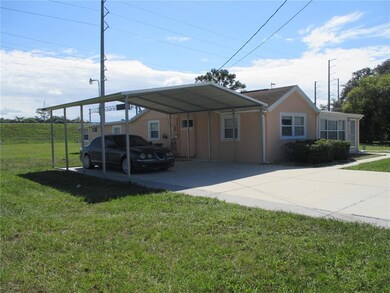 Left side of home showing carport