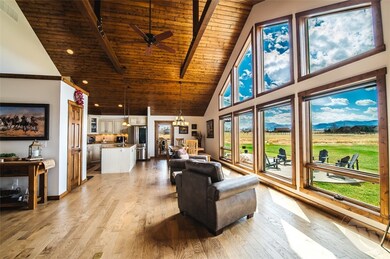 Large living areas with hardwood are elegant but t