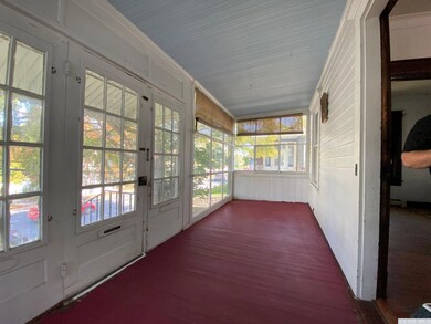 Main view of enclosed front porch