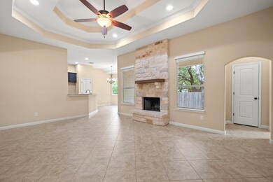 Unfurnished living room with ceiling fan, ornamen