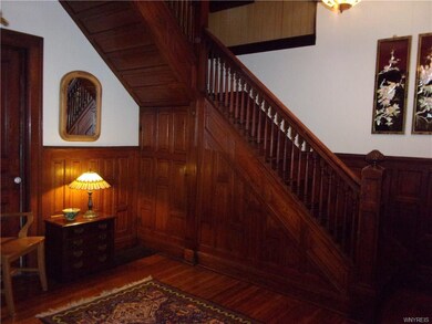 FRONT FOYER SHOWING THE BEAUTIFUL WOOD