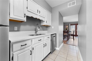white and bright kitchen - new quartz countertop a