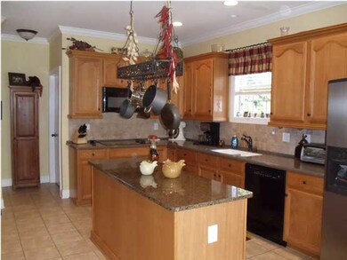 gorgeous kitchen with granite and corian --