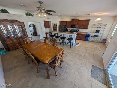 Dining room featuring light tile patterned floors,