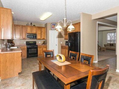 Breakfast Area/Room. Space enough for a large table and chairs in this eat in kitchen.