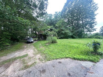 Small ranch home on lot.