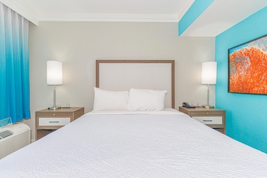 Bedroom featuring crown molding