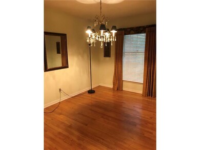 Lovely formal dining room with hardwood floors in 