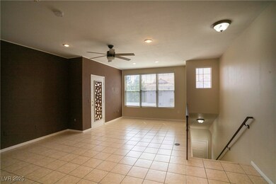 Living room featuring light tile patterned floorin