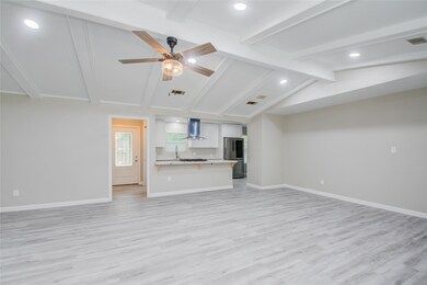 Another view of Family Room and Foyer & Kitchen