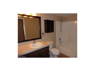 Full bath - Ceramic Flooring updated cabinets, sin