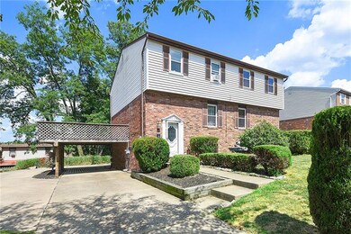 LARGE WRAP-AROUND DECK PROVIDES ADDITIONAL COVERED PARKING