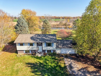 5670 Fowlerville Rd, Fowlerville, MI 48836 - photo 2