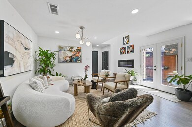 Living room featuring light hardwood / wood-style 
