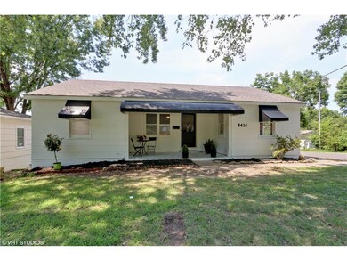 CORNER LOT WITH COZY ENCLOSED LIVING SPACE!