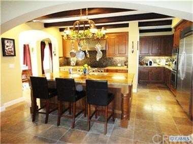 Gourmet kitchen with stainless steel appliances, p