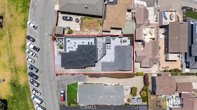 Two homes on a lot.  3 sets of laundry's, 2 new kitchens, 4 new bathrooms.