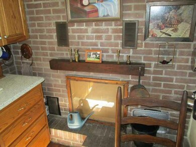 Kitchen. Kitchen showing counter tops and fireplac