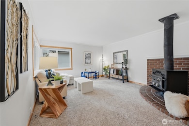 Bonus room with wood burning fireplace.