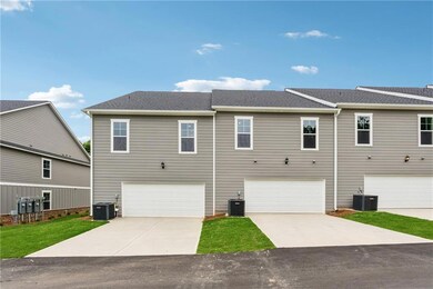 2 Car Garage with Garage door opener is rear entry