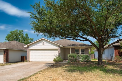 Ranch-style home featuring an attached garage, co