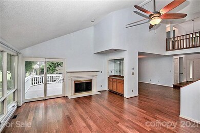 Family room with vaulted ceiling, fireplace, wetba