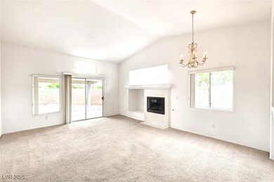 Living Room & Dining Area With Gas Fireplace.