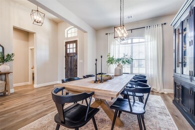 The formal dining room easily fits a table for 8.