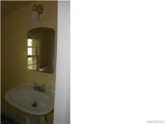 Updated half bath.  Notice new lighting feature an