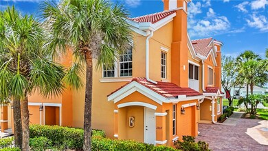 View of front of property featuring a tiled roof,