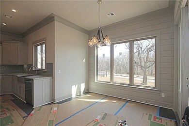 Eat-in kitchen with tons of natural light overlook