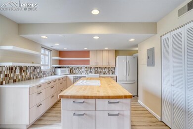 Kitchen with a large island - tastefully updated!!