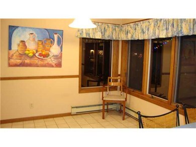 Kitchen. Large kitchen eating area with corner win