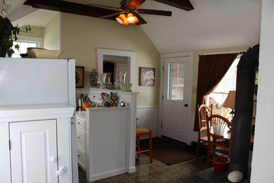 Eat in galley kitchen with cathedral...
