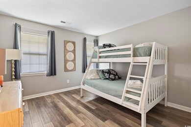 Bedroom featuring hardwood / wood-style floors