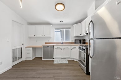 Kitchen with laundry room to the left